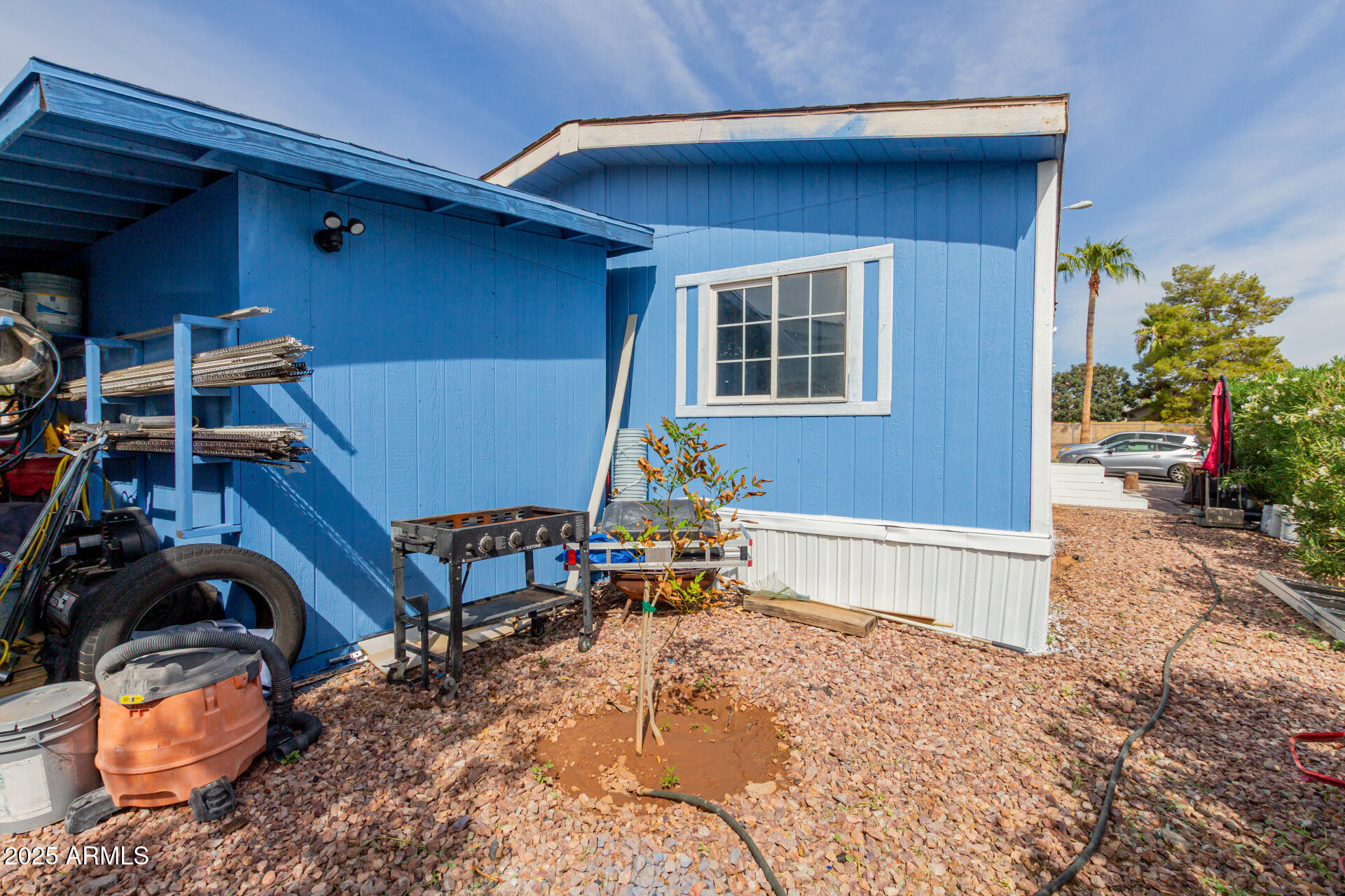 555 West Warner Road, Unit 139 Chandler, AZ 85225 - Photo 16 of 21 a house view with a backyard space