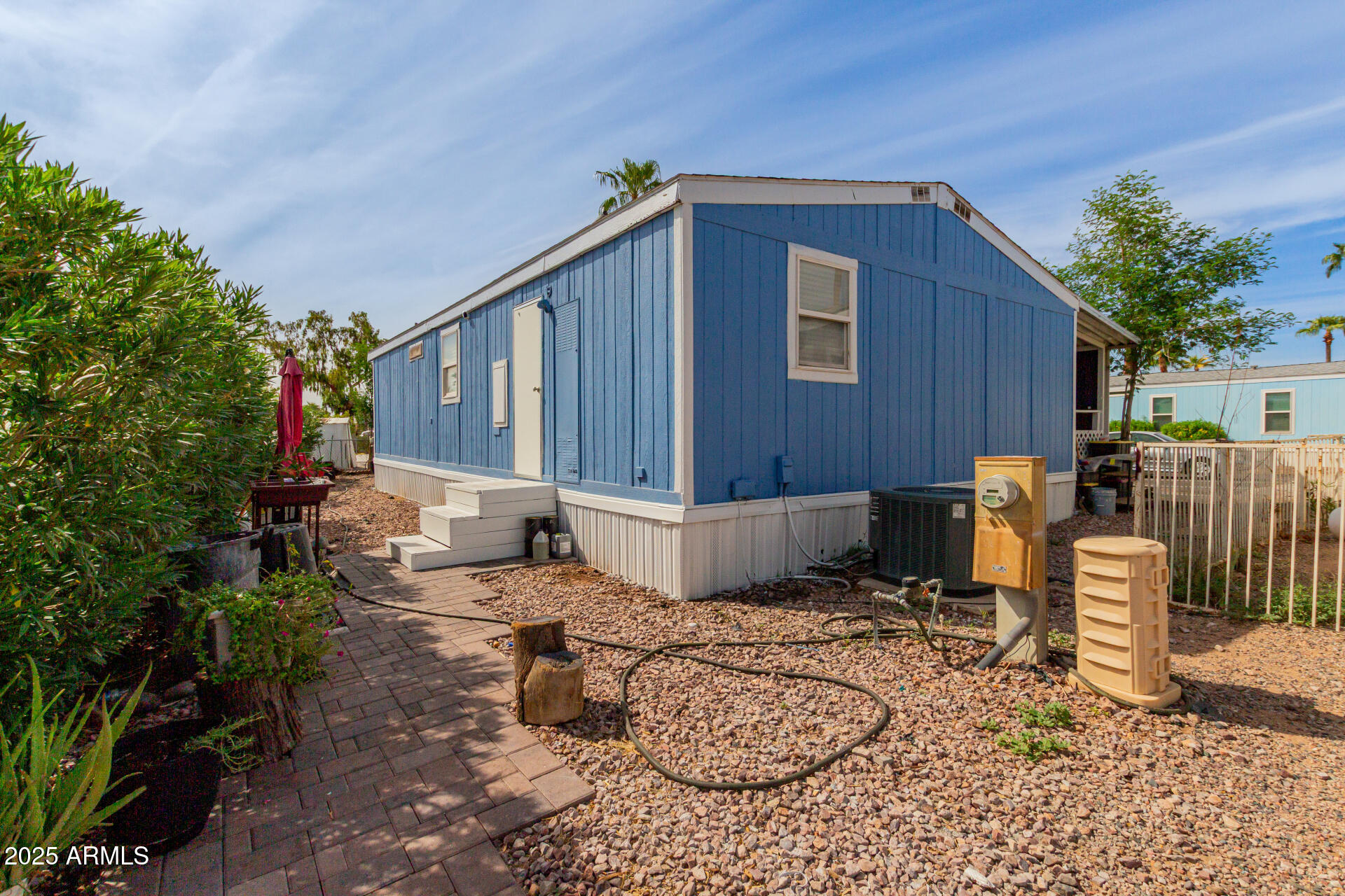 555 West Warner Road, Unit 139 Chandler, AZ 85225 - Photo 18 of 21 a view of a house with backyard and sitting area