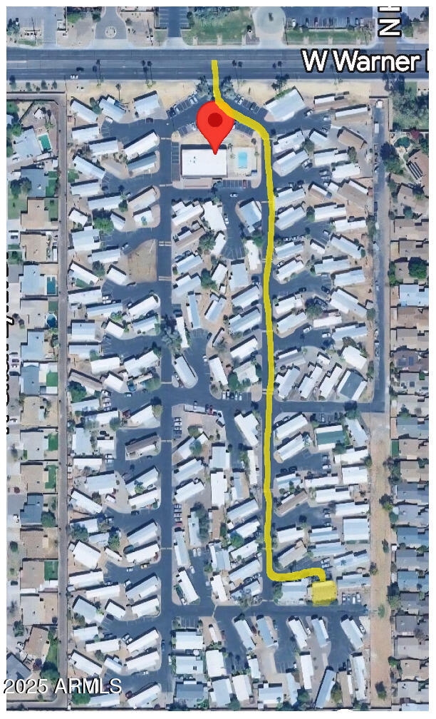 555 West Warner Road, Unit 139 Chandler, AZ 85225 - Photo 21 of 21 a street sign that is sitting in the middle of a building