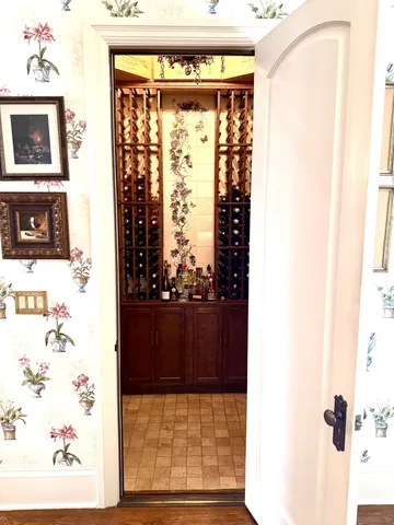 a bathroom with a granite countertop toilet a sink and a mirror