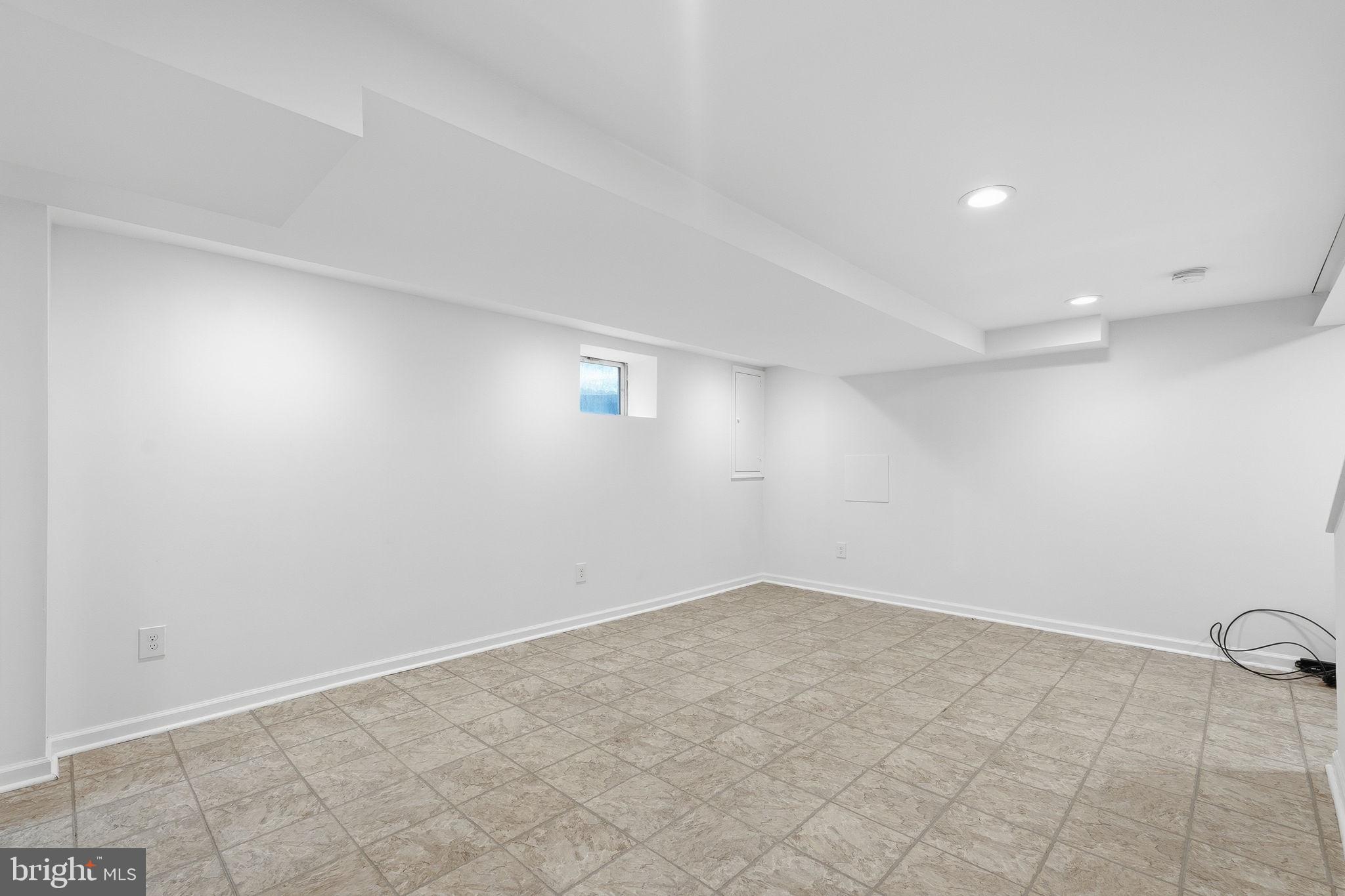 11977 Andrew Street Silver Spring, MD 20902 - Photo 23 of 28 Large basement rec room