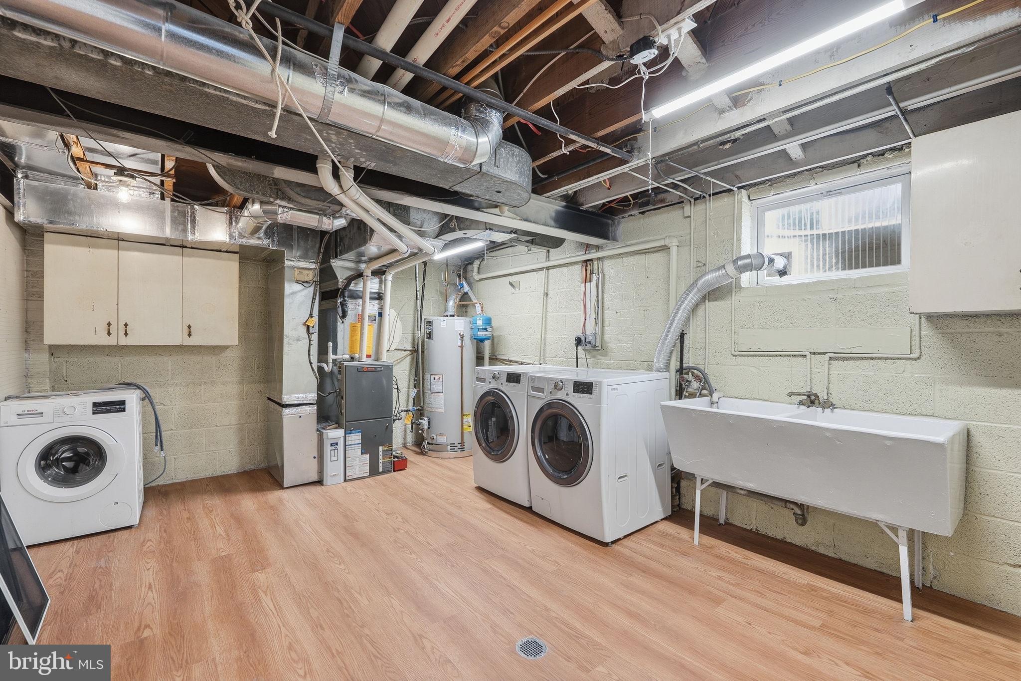 11977 Andrew Street Silver Spring, MD 20902 - Photo 25 of 28 Large laundry and storage room
