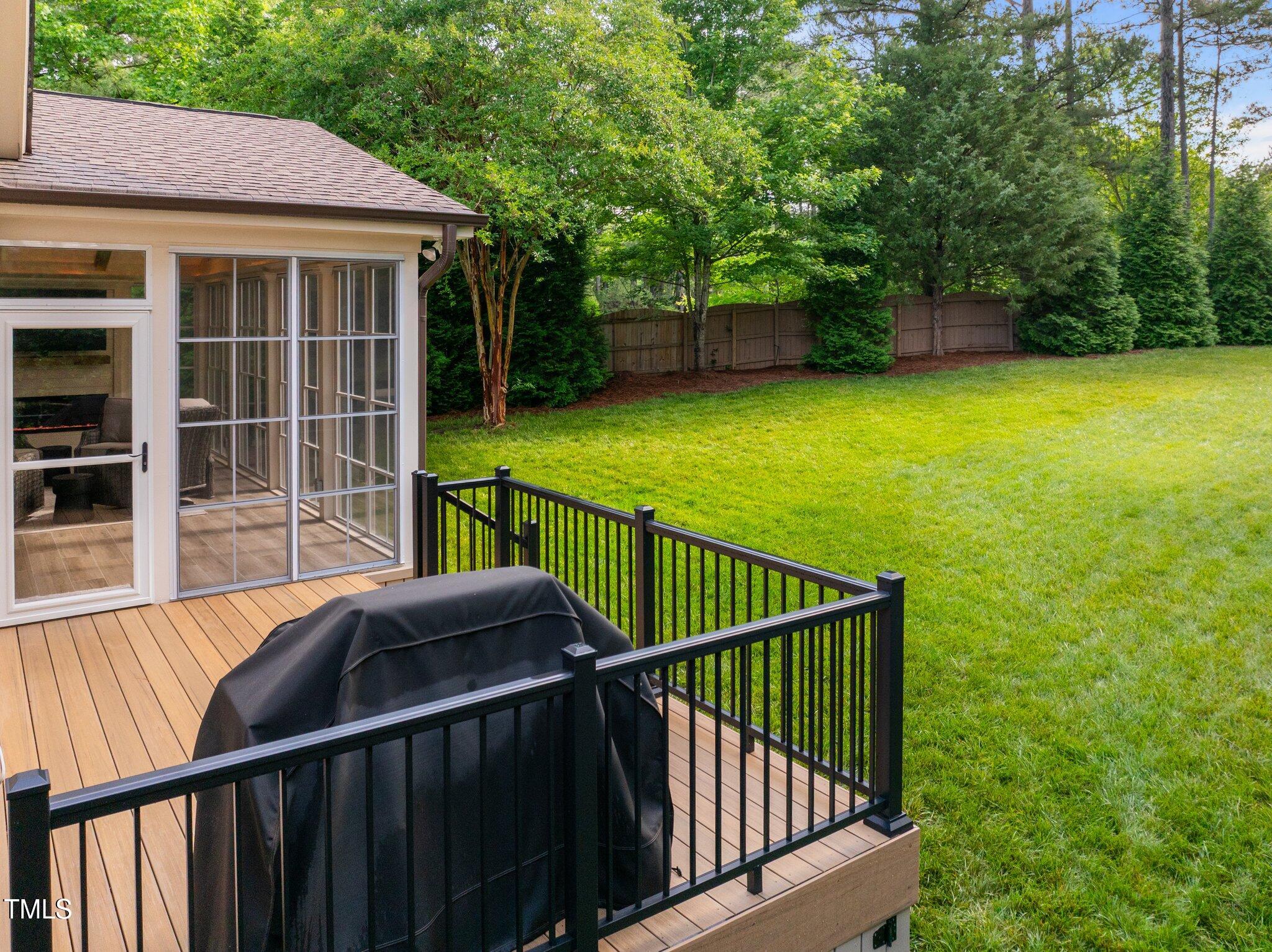 6648 Mafolie Court Raleigh, NC 27613 - Photo 48 of 57 Back Deck & Yard
