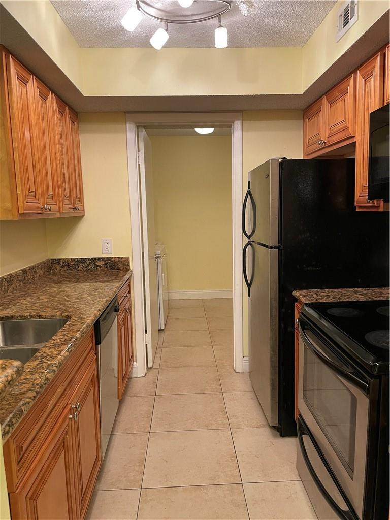 5646 Rock Island Road, Unit 211 Tamarac, FL 33319 - Photo 5 of 35 Photo 5