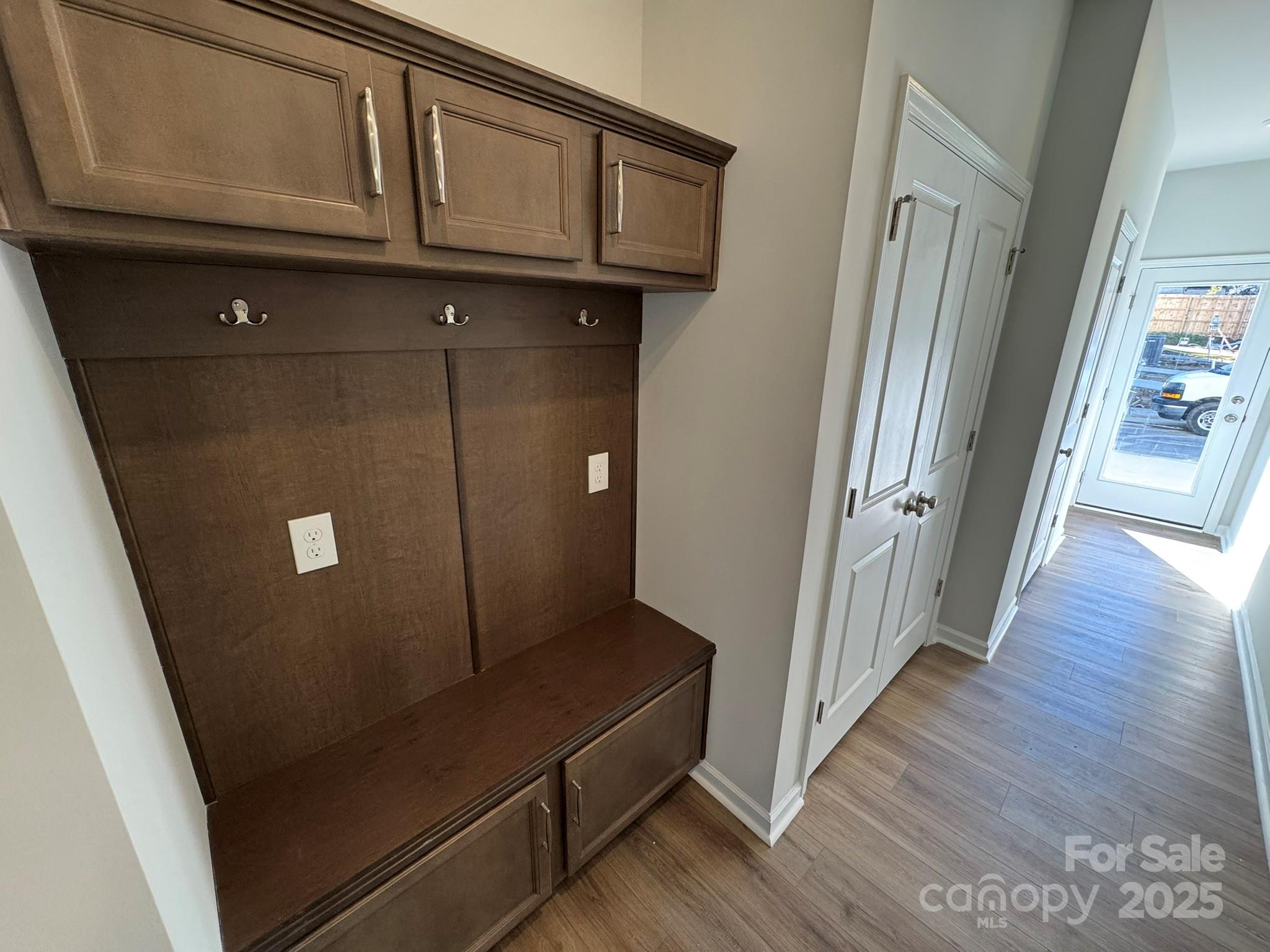 4720 Lakeview Road, Unit 12 Charlotte, NC 28216 - Photo 12 of 41 a view of a hallway with wooden floor
