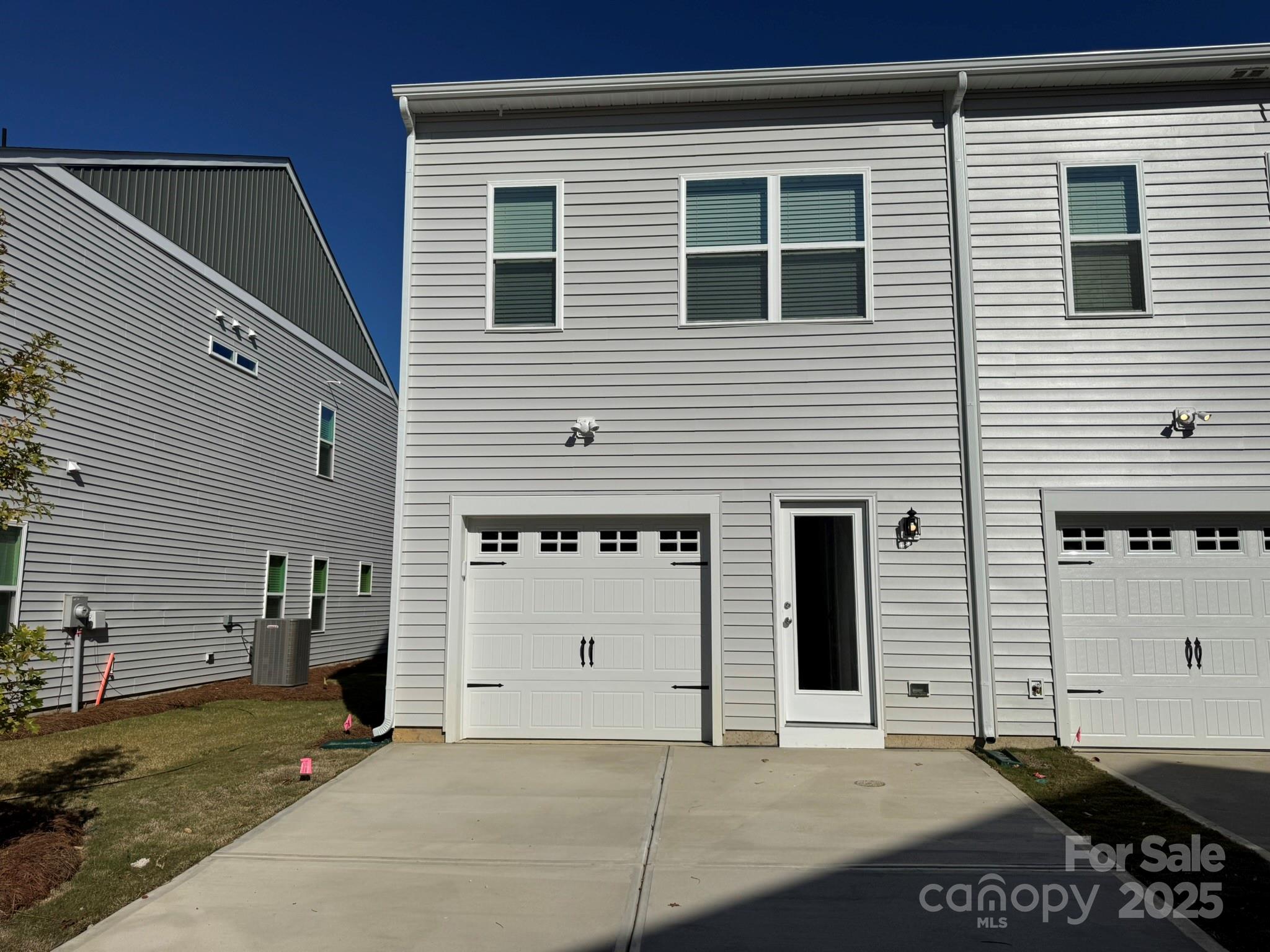 4720 Lakeview Road, Unit 12 Charlotte, NC 28216 - Photo 16 of 41 a view of a house with garage