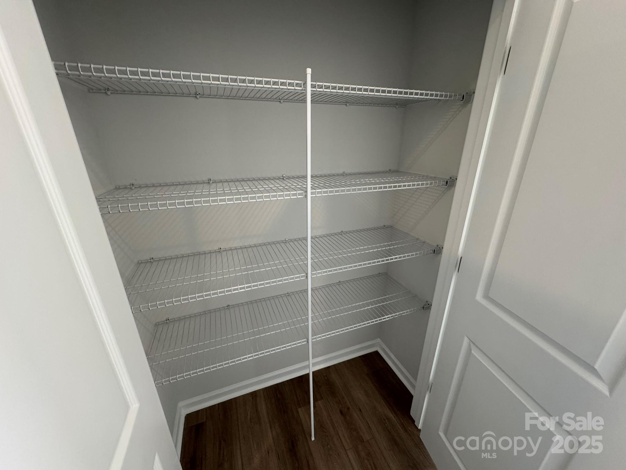 4720 Lakeview Road, Unit 12 Charlotte, NC 28216 - Photo 20 of 41 a view of walk in closet with empty racks