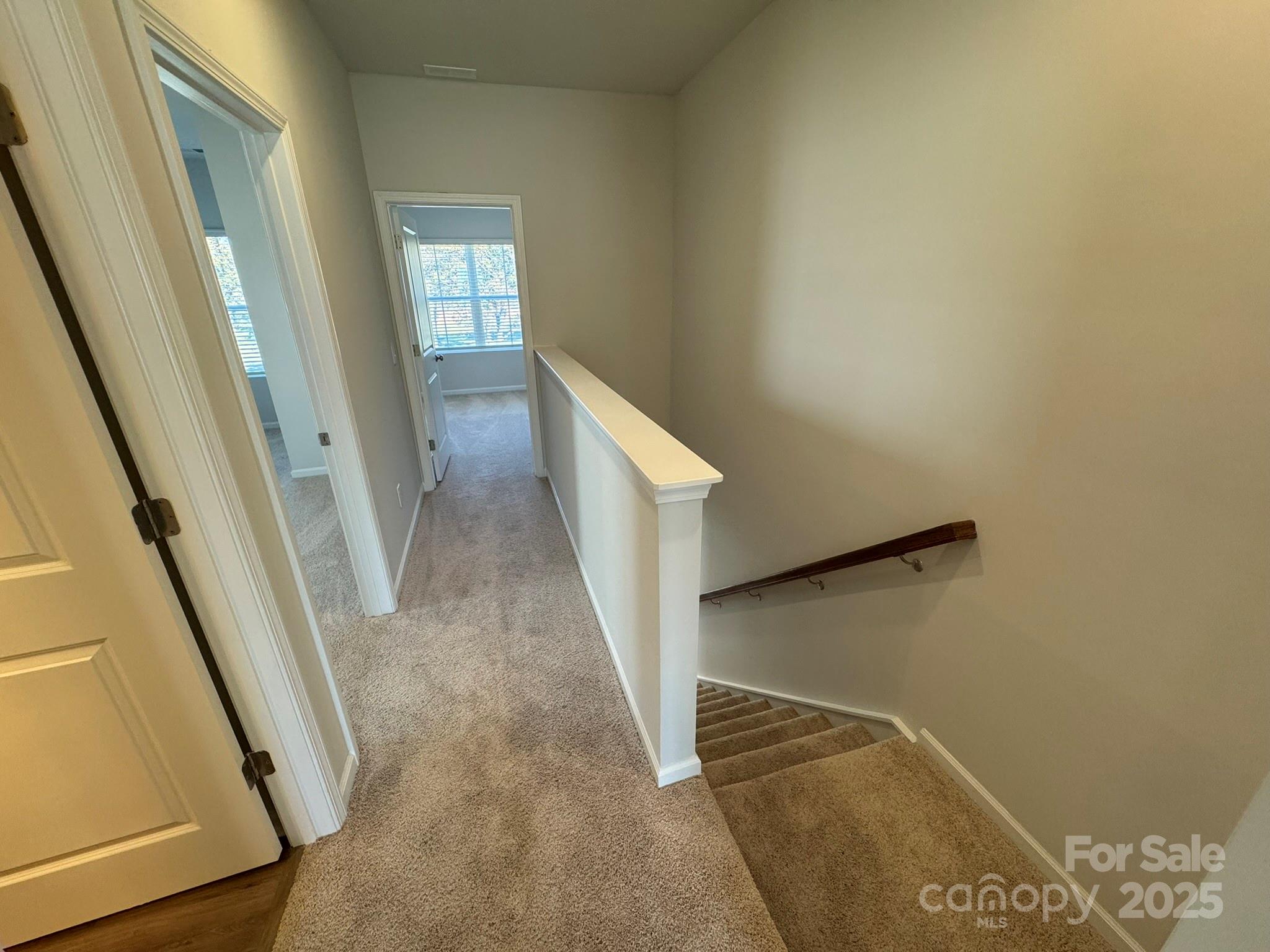 4720 Lakeview Road, Unit 12 Charlotte, NC 28216 - Photo 24 of 41 a view of a hallway with staircase
