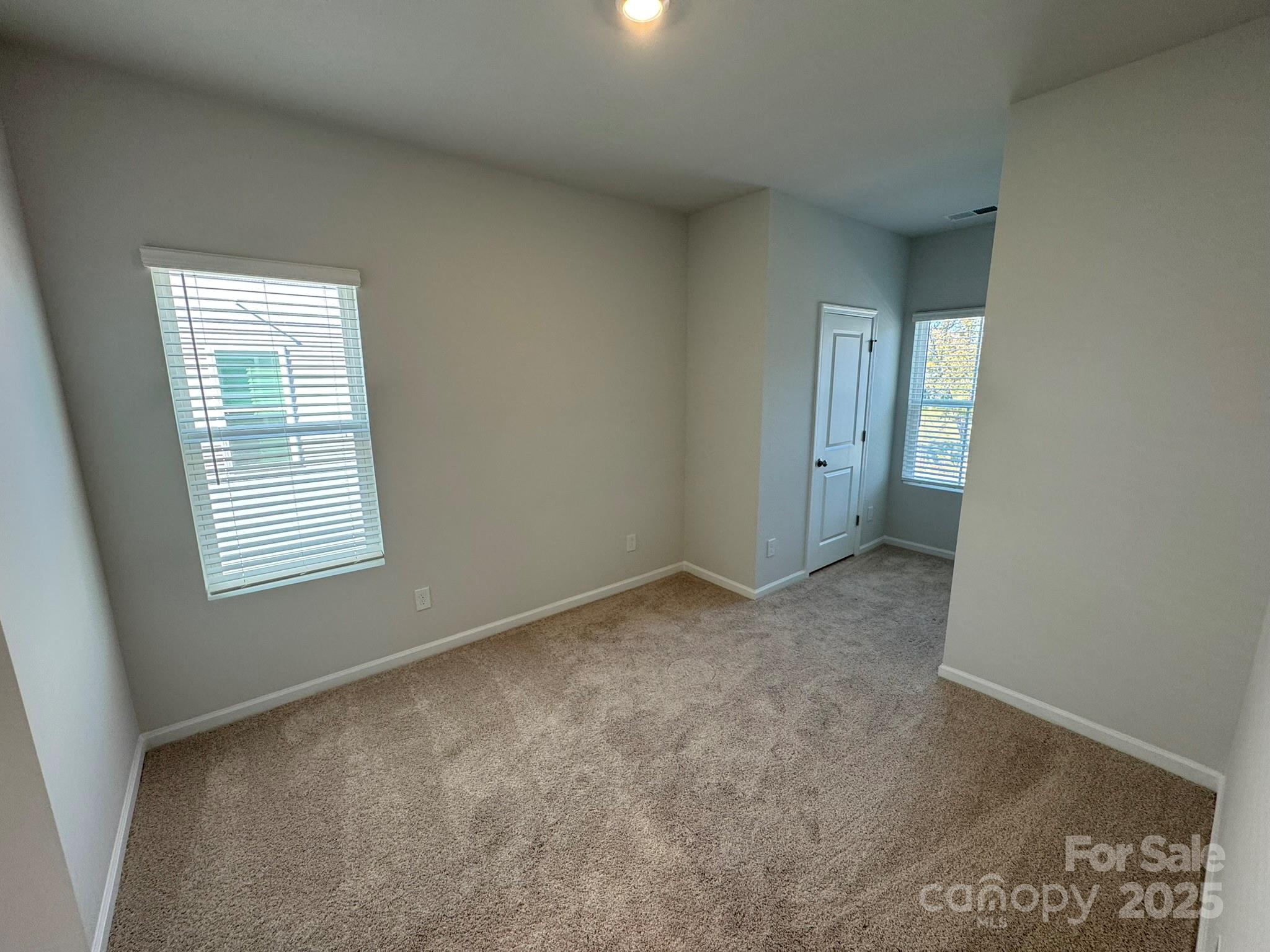 4720 Lakeview Road, Unit 12 Charlotte, NC 28216 - Photo 26 of 41 a view of an empty room with a window