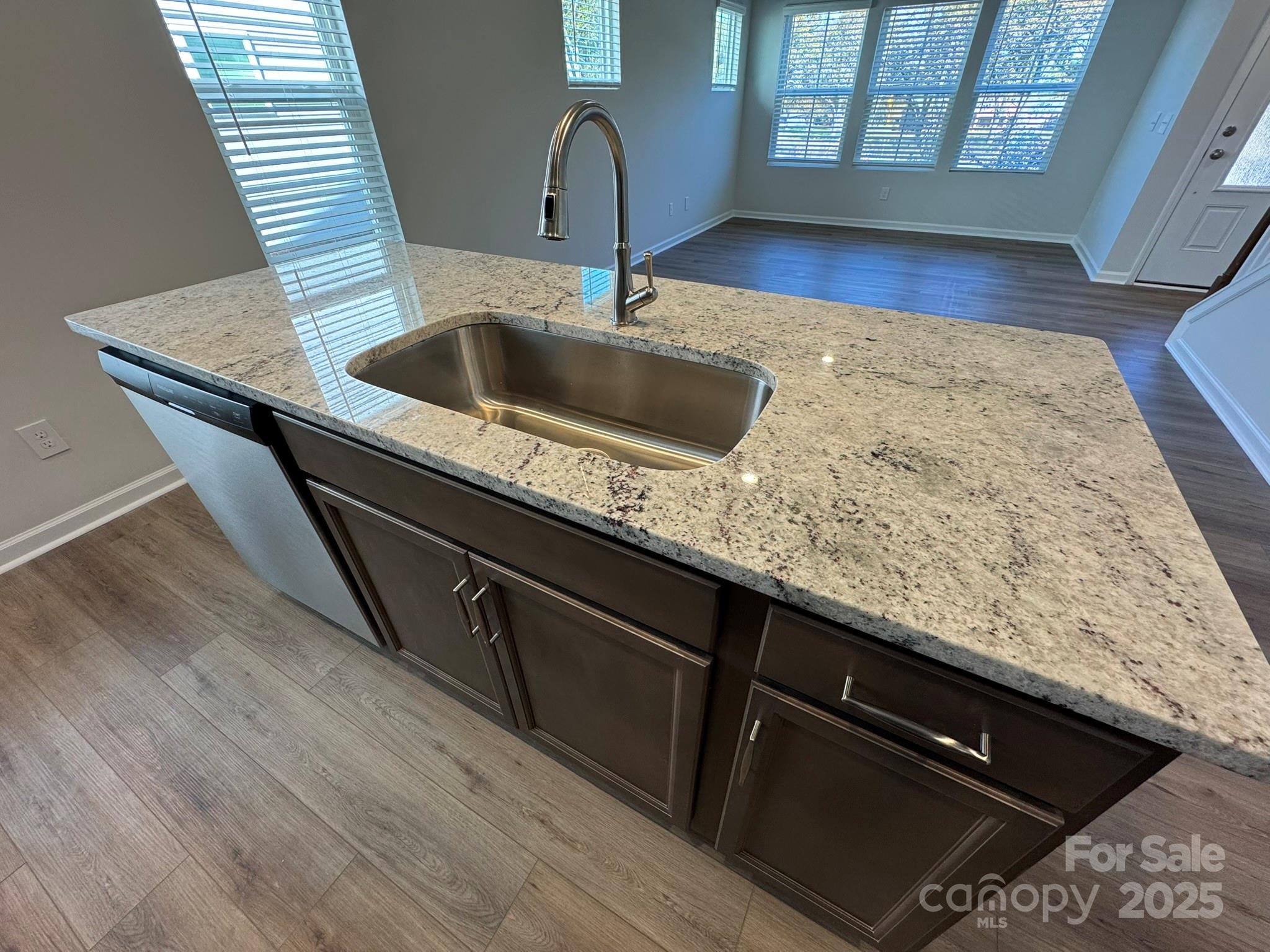 4720 Lakeview Road, Unit 12 Charlotte, NC 28216 - Photo 7 of 41 a kitchen with sink and window