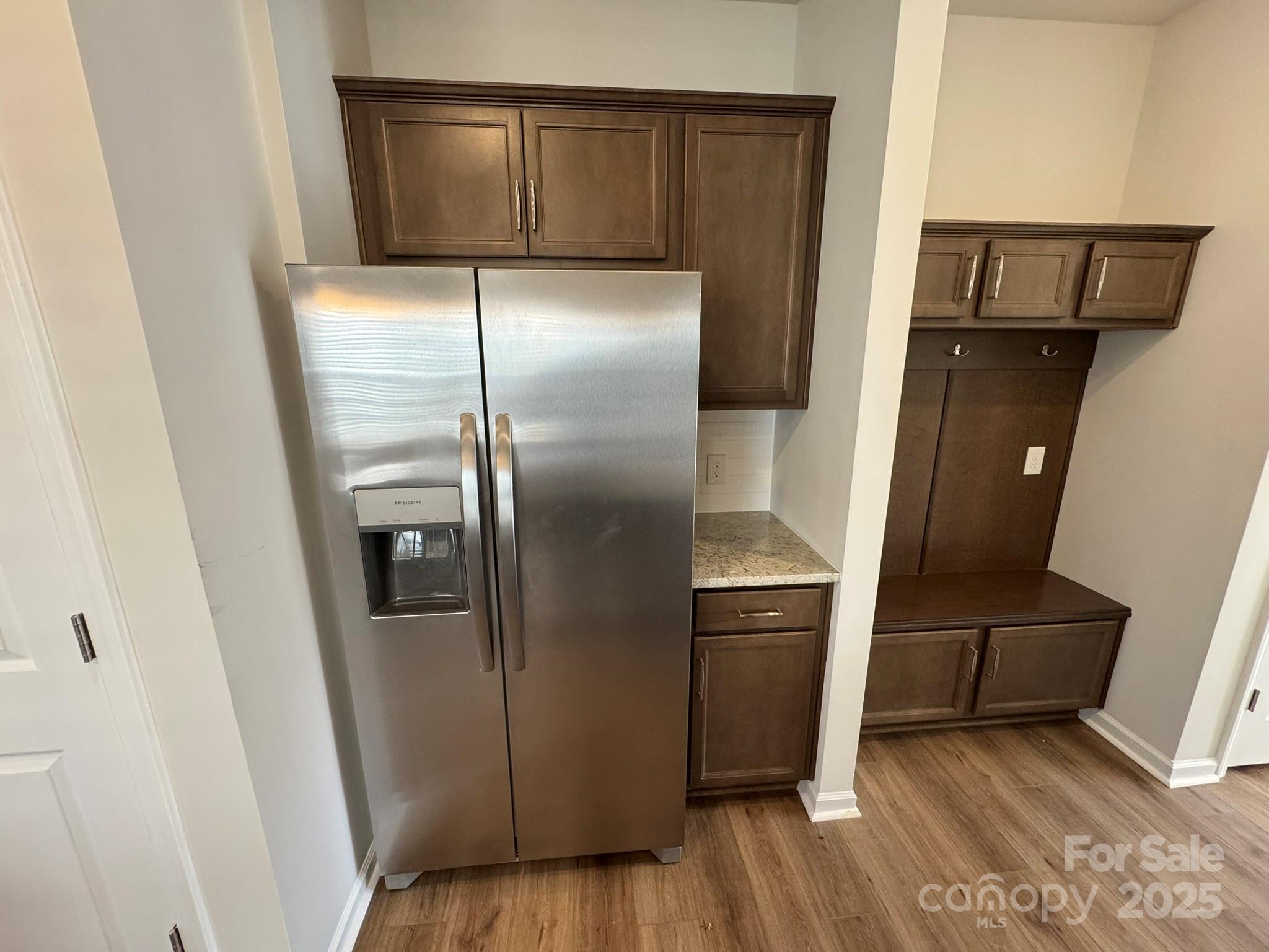 4720 Lakeview Road, Unit 12 Charlotte, NC 28216 - Photo 10 of 41 a kitchen with metallic refrigerator freezer and a dishwasher