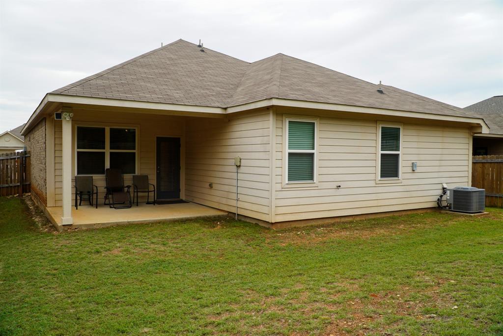 13624 Helix Bridge Way Crowley, TX 76036 - Photo 24 of 25 a front view of a house with a yard