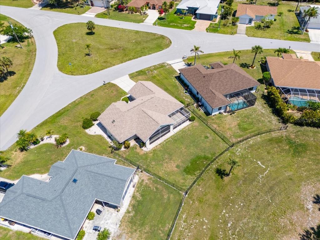 7334 North Tulip Tree Punta Gorda, FL 33955 - Photo 28 of 33 an aerial view of a house with a swimming pool