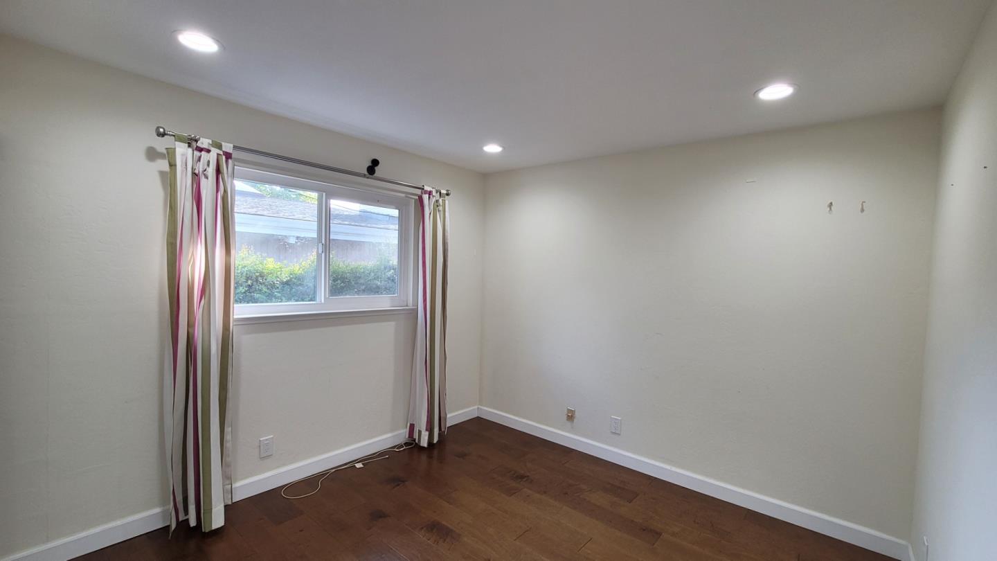 1324 Flicker Way Sunnyvale, CA 94087 - Photo 11 of 16 a view of an empty room with a window