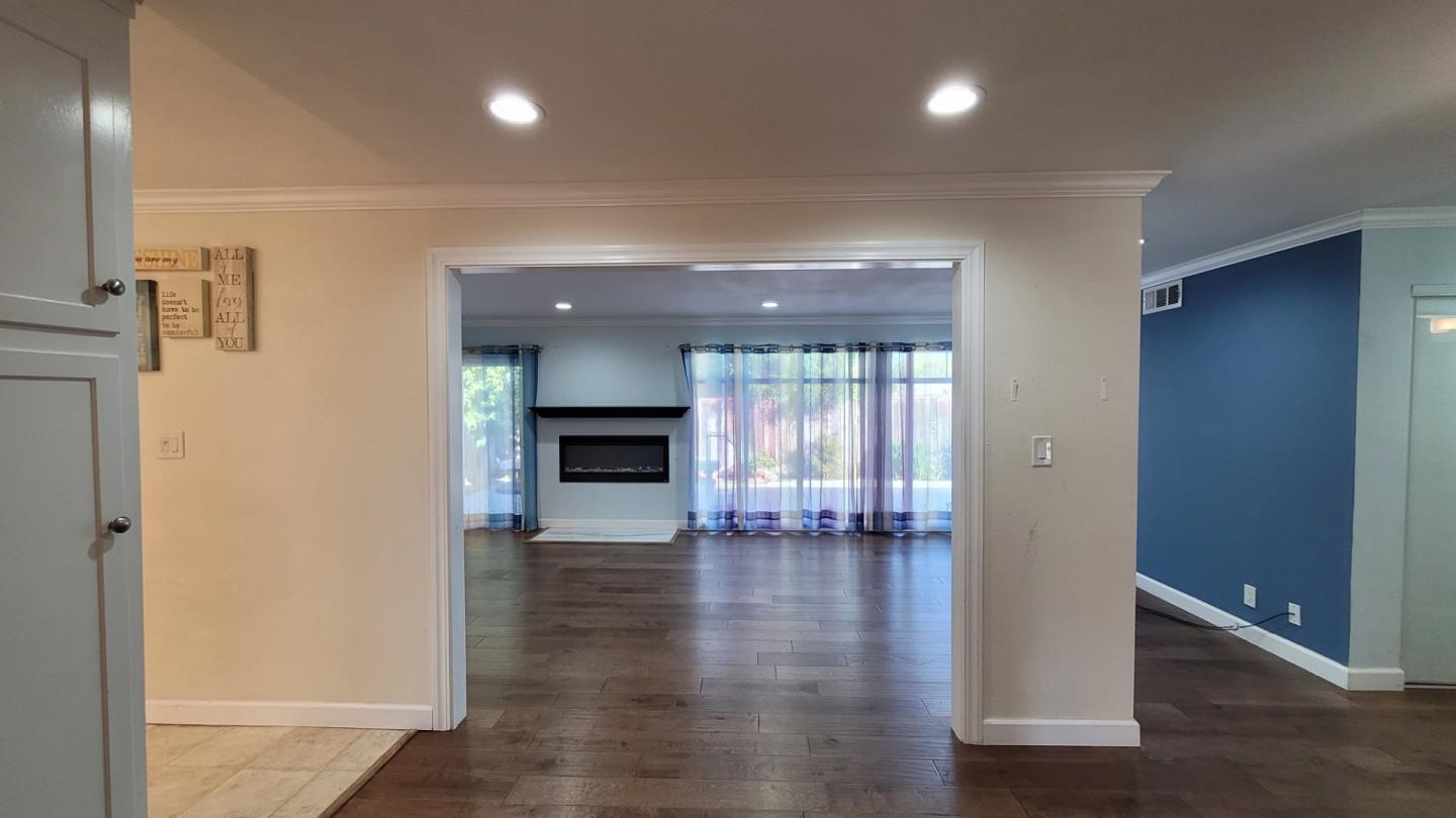 1324 Flicker Way Sunnyvale, CA 94087 - Photo 4 of 16 a view of empty room with wooden floor