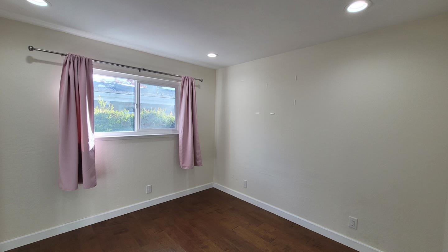 1324 Flicker Way Sunnyvale, CA 94087 - Photo 10 of 16 an empty room with a window