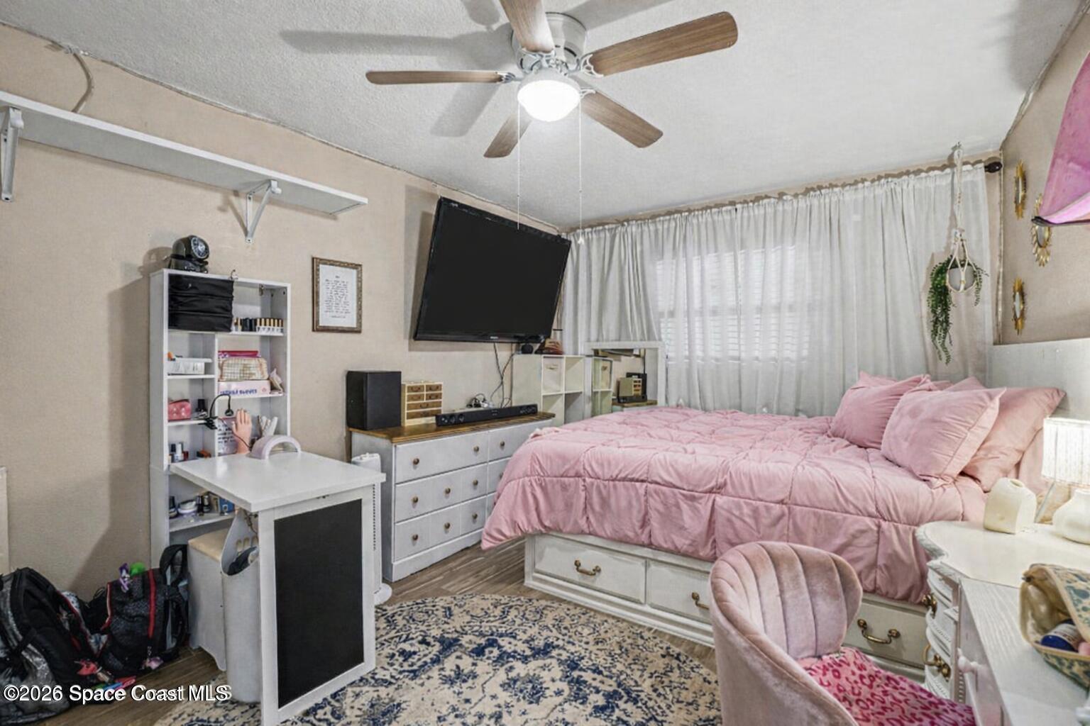 2150 Jason Street Merritt Island, FL 32952 - Photo 20 of 38 Cozy pink-themed bedroom setup (1)