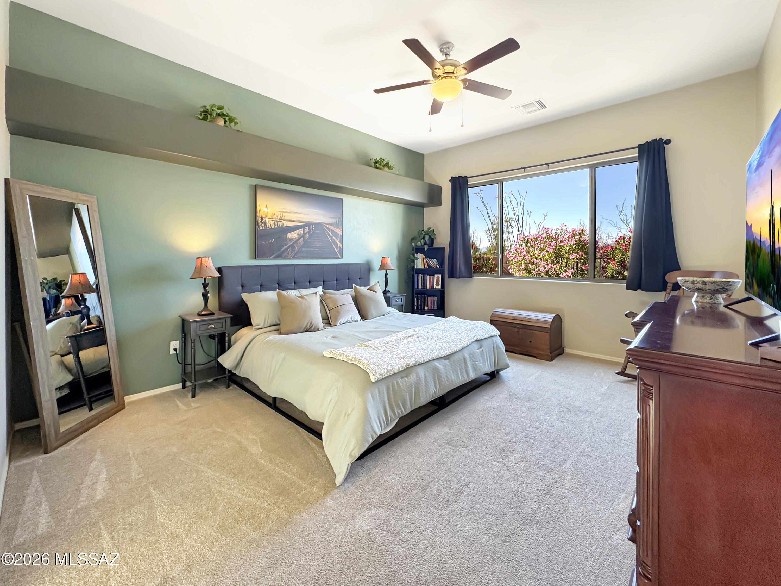 10835 South Heart Break Ridge Place Vail, AZ 85641 - Photo 20 of 49 a bedroom with a bed a window and dresser