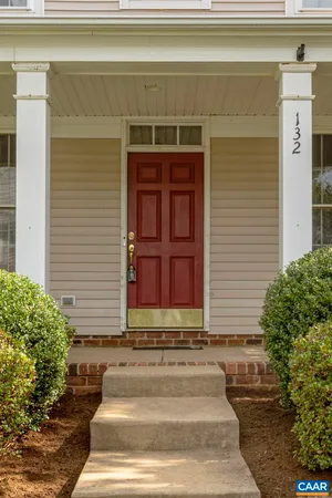 a view of a porch and garden