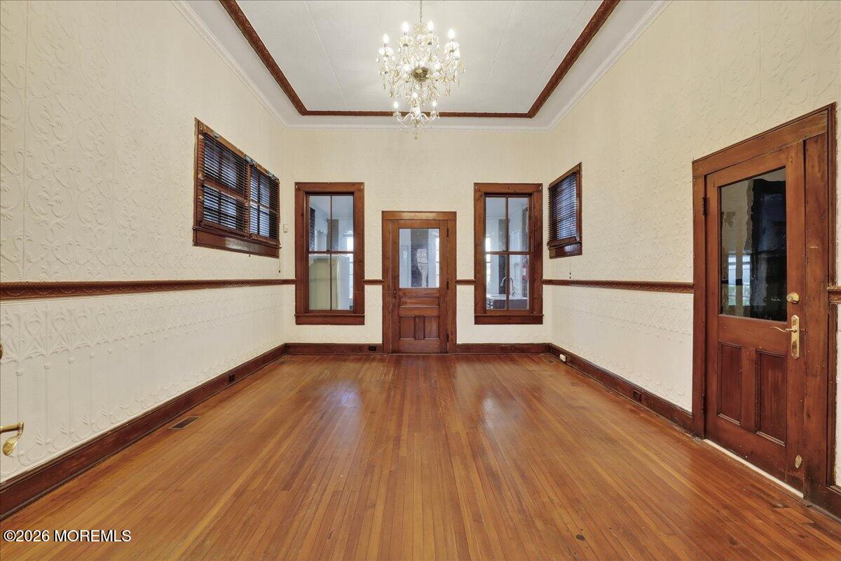 Front Street Keyport, NJ 07735 - Photo 18 of 42 a view of an empty room with wooden floor and a window