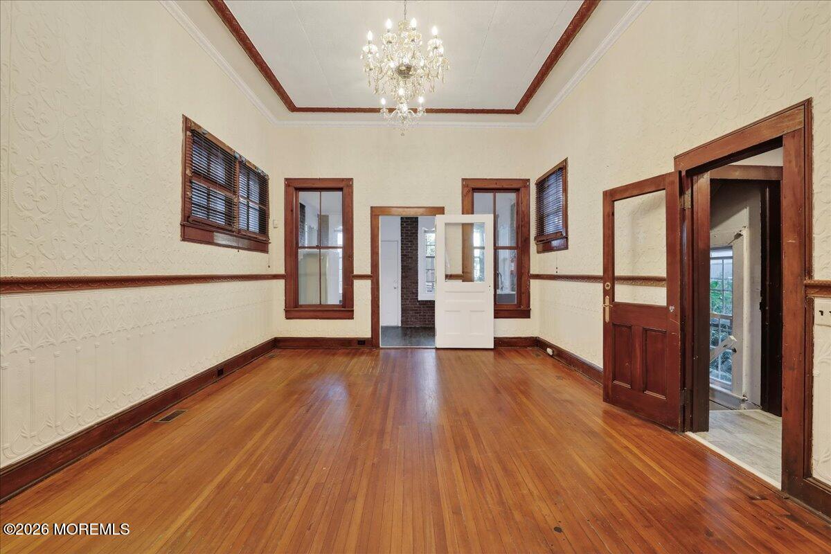 Front Street Keyport, NJ 07735 - Photo 20 of 42 a view of an empty room with wooden floor and a window