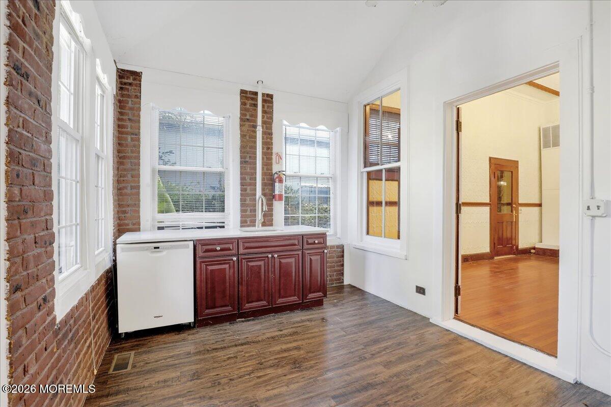Front Street Keyport, NJ 07735 - Photo 21 of 42 a large white room with wooden floor and furniture