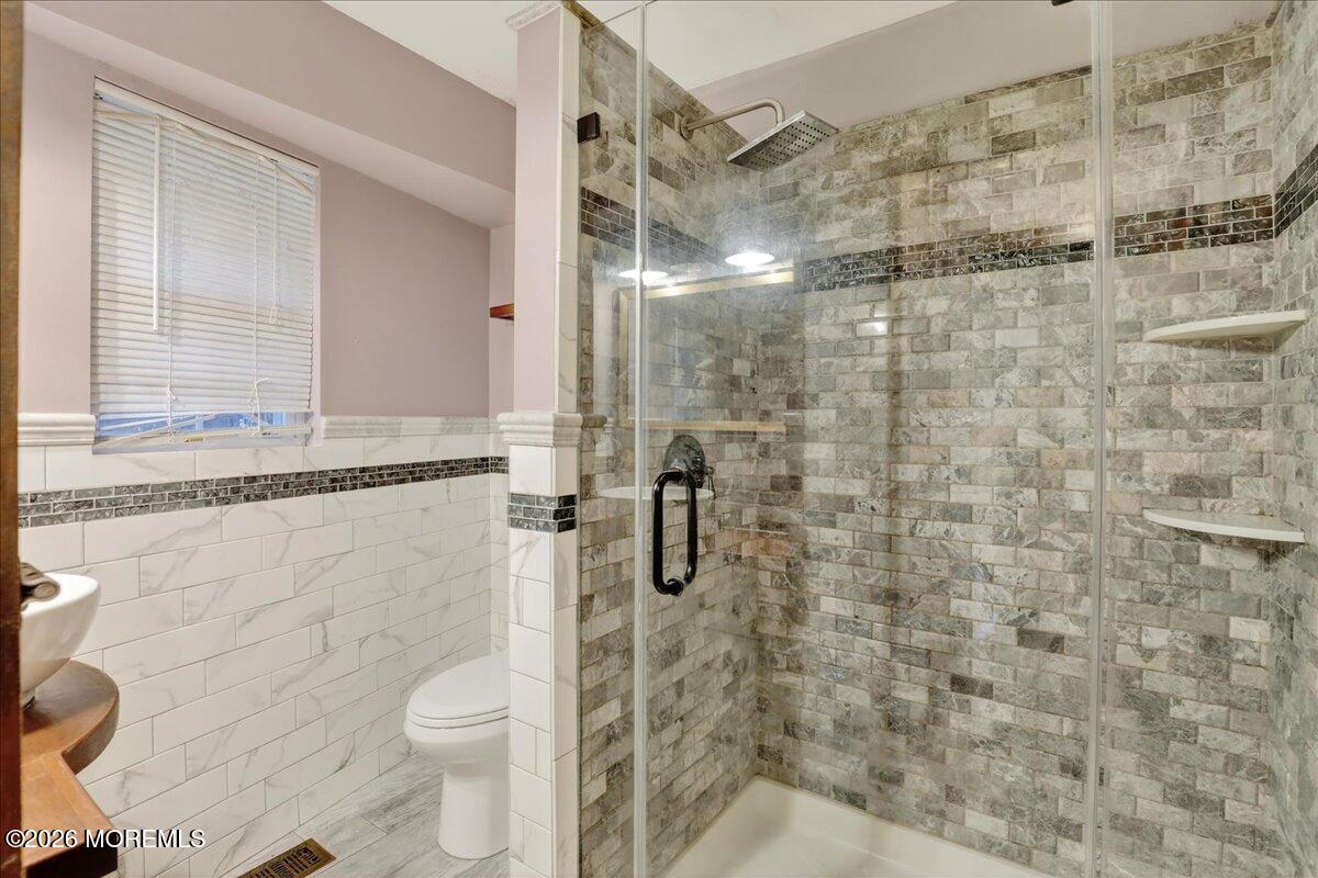 Front Street Keyport, NJ 07735 - Photo 23 of 42 a bathroom with a shower and a toilet