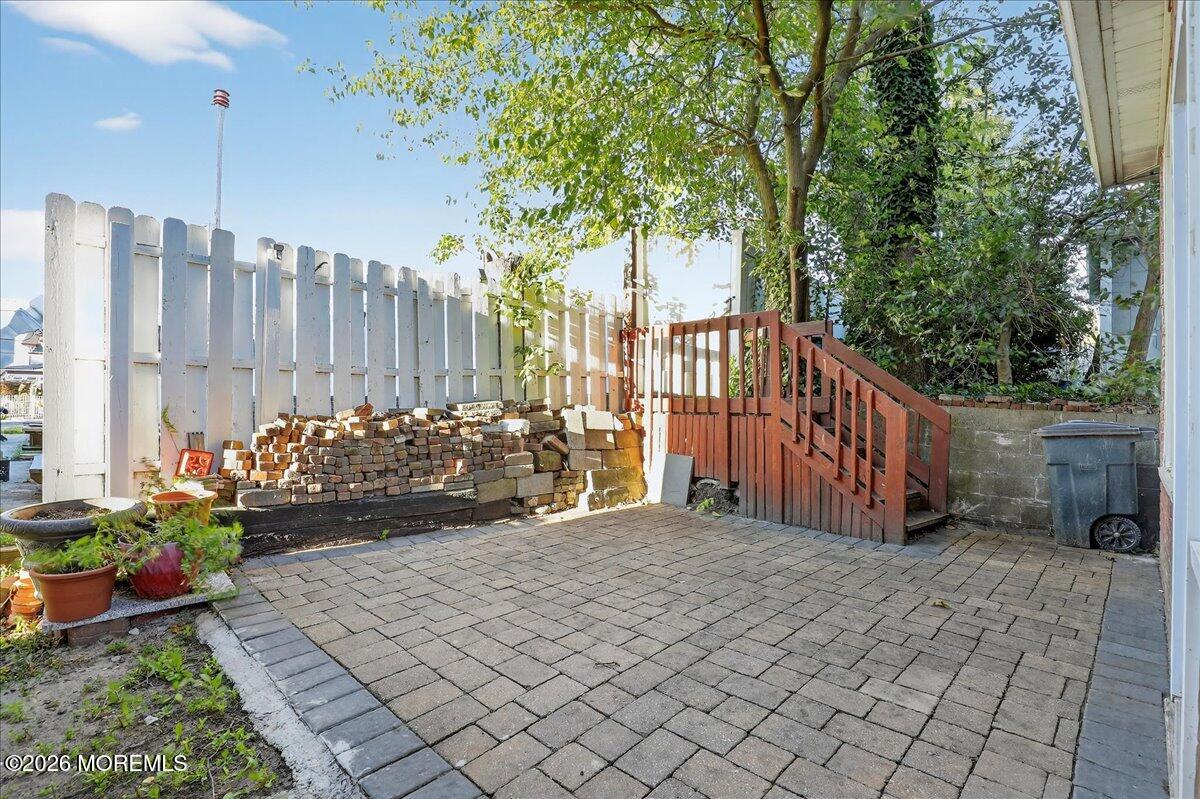 Front Street Keyport, NJ 07735 - Photo 33 of 42 a view of a chair and table in the backyard