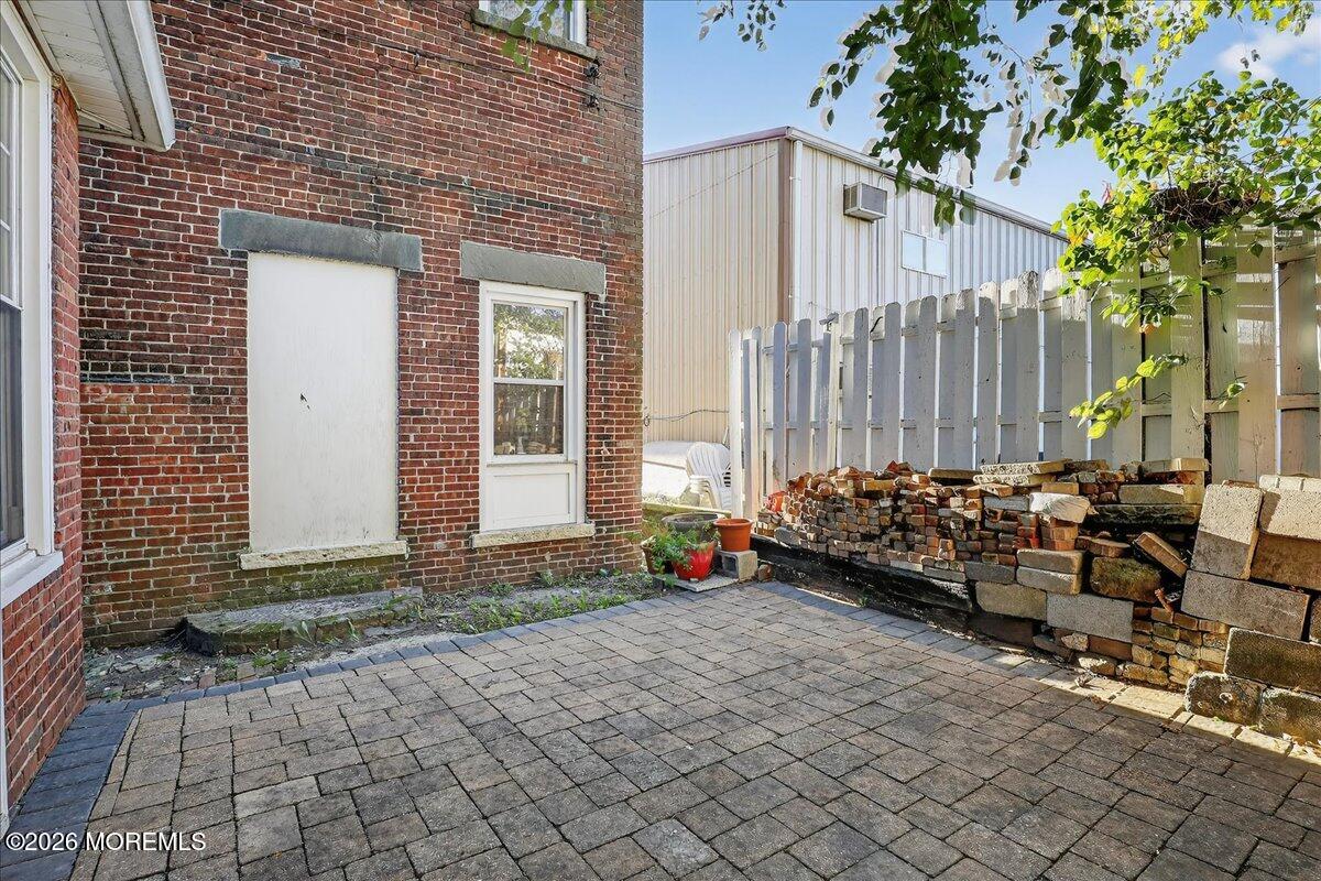 Front Street Keyport, NJ 07735 - Photo 38 of 42 a view of a house with backyard and sitting area