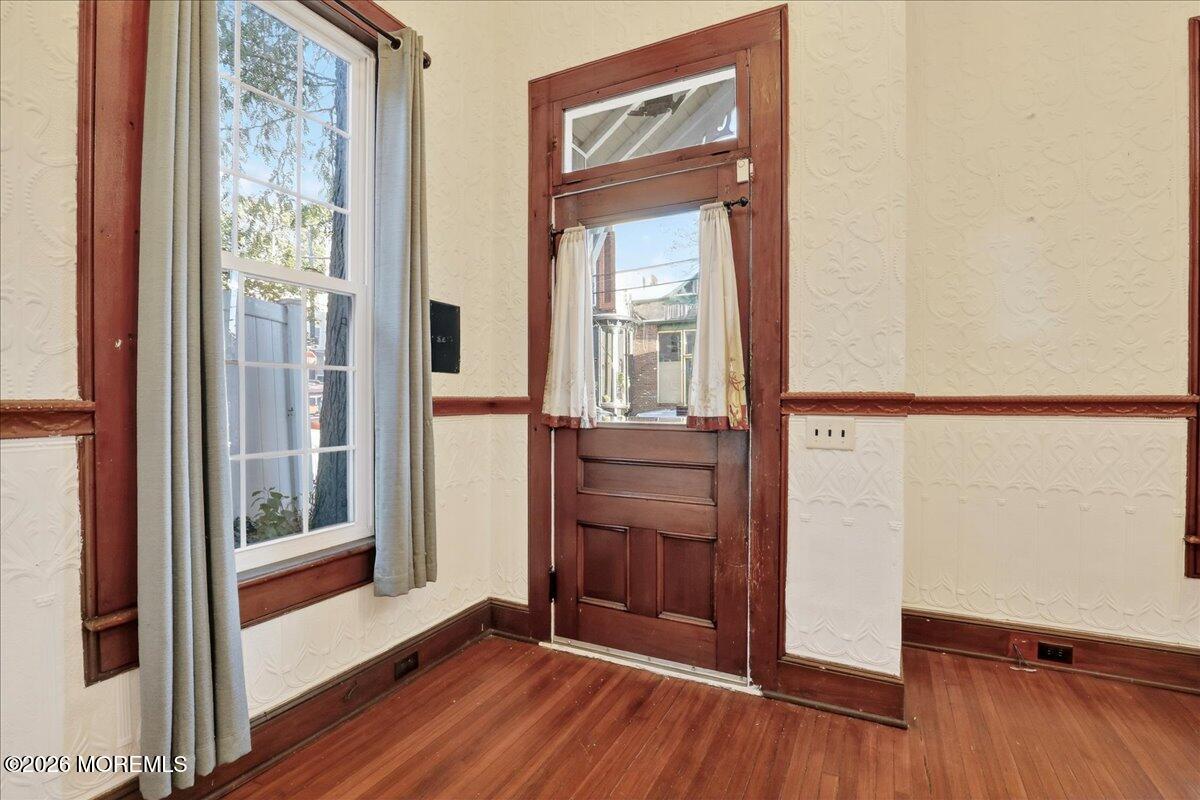 Front Street Keyport, NJ 07735 - Photo 8 of 42 a view of an entryway with wooden floor
