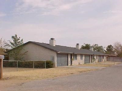 13625 Yakima Road Apple Valley, CA 92308 - Photo 1 of 1 a front view of a house with a yard