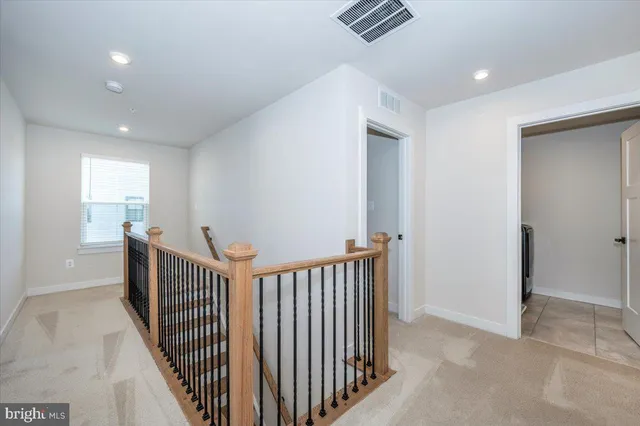 a view of a room with racks on the wall