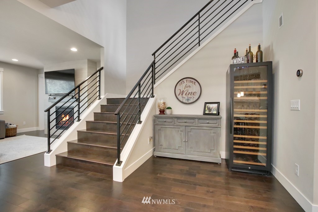 317 Field Place Southeast Renton, WA 98059 - Photo 14 of 29 a view of entryway with stairs and wooden floor