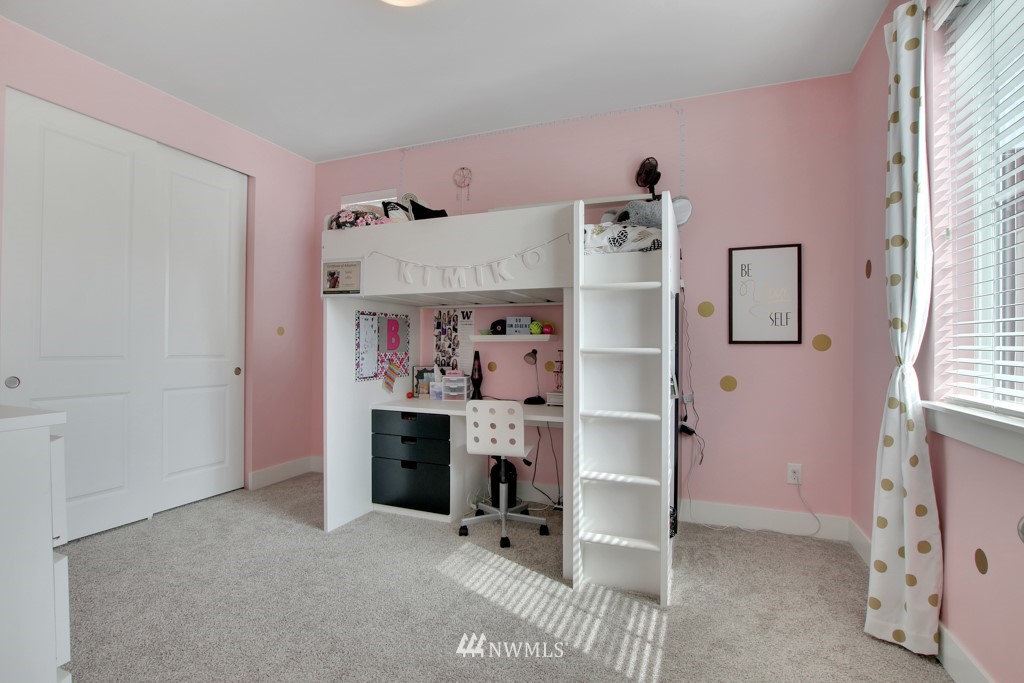 317 Field Place Southeast Renton, WA 98059 - Photo 22 of 29 a view of room with furniture and a fireplace