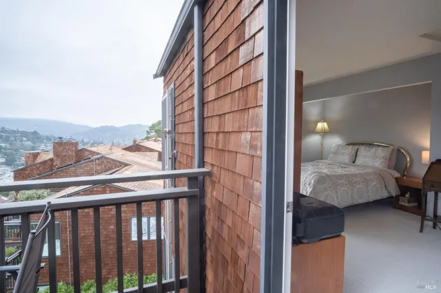 a view of a hallway with washer and dryer