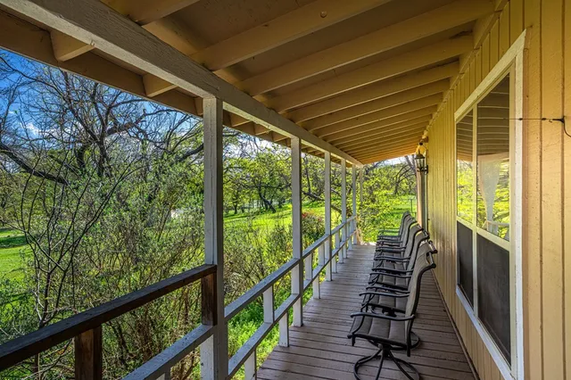 a view of a city street from a balcony