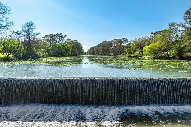a wooden fence with lake view