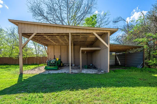 a view of a chair under an umbrella