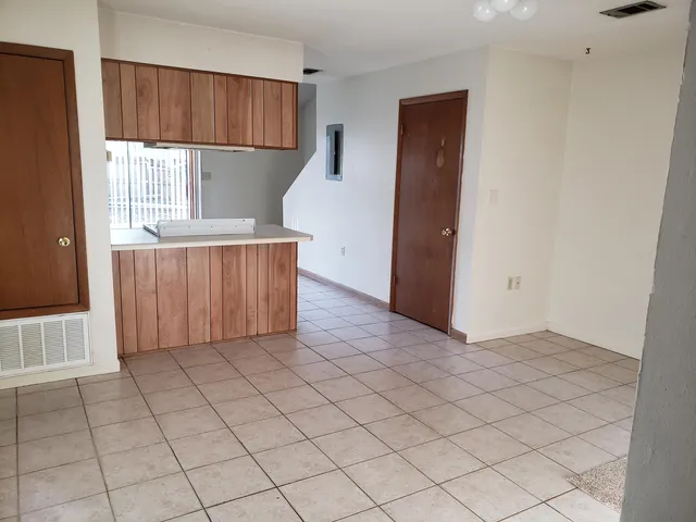 an empty room with windows