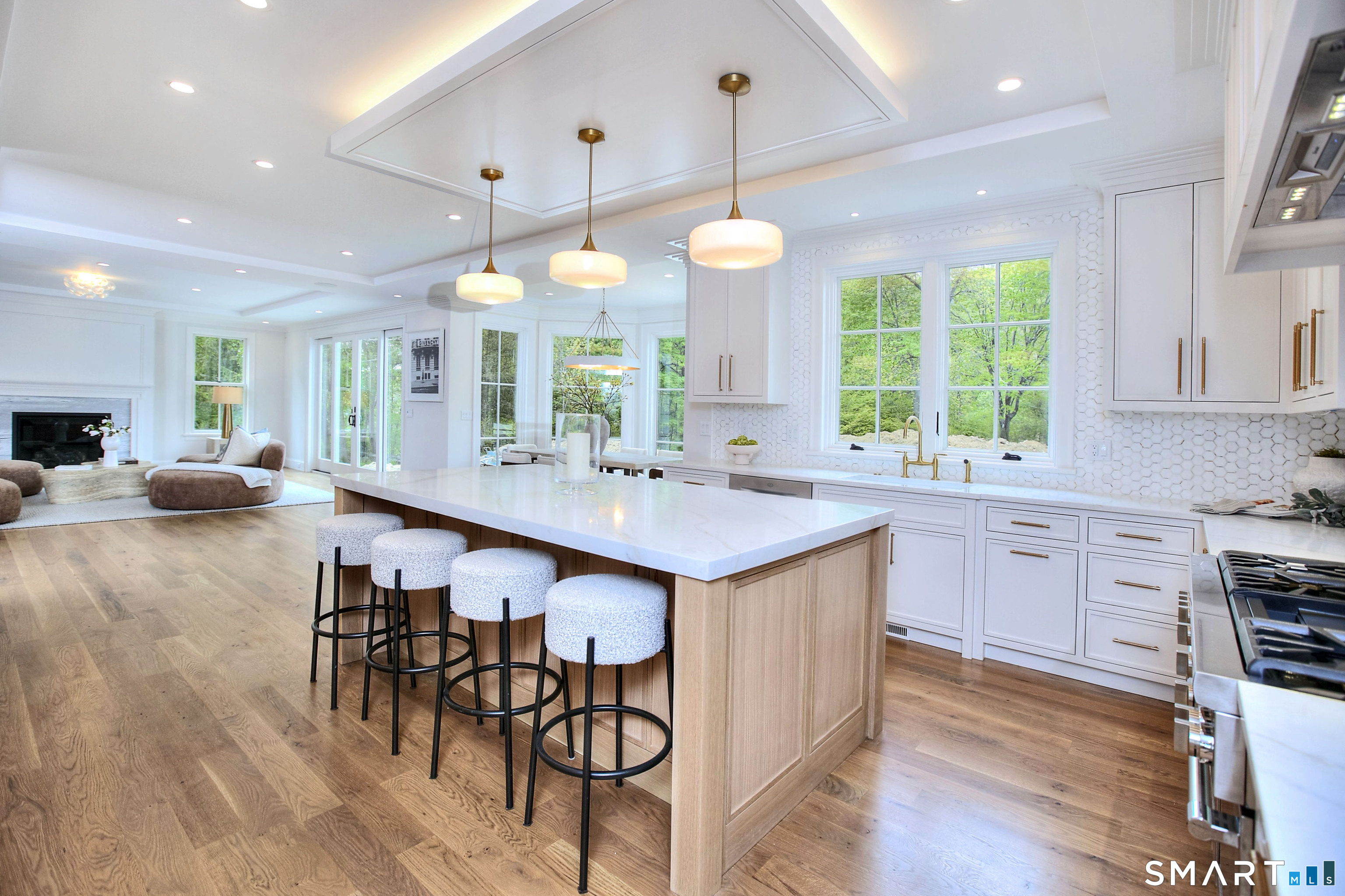 48 Kettle Creek Road Weston, CT 06883 - Photo 10 of 40 a kitchen with lots of counter space and dining table