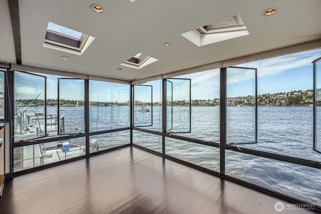 a view of a living room with a large window