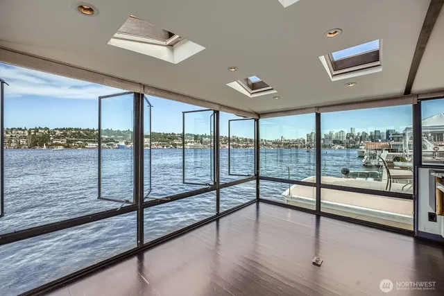 a view of an entryway with wooden floor