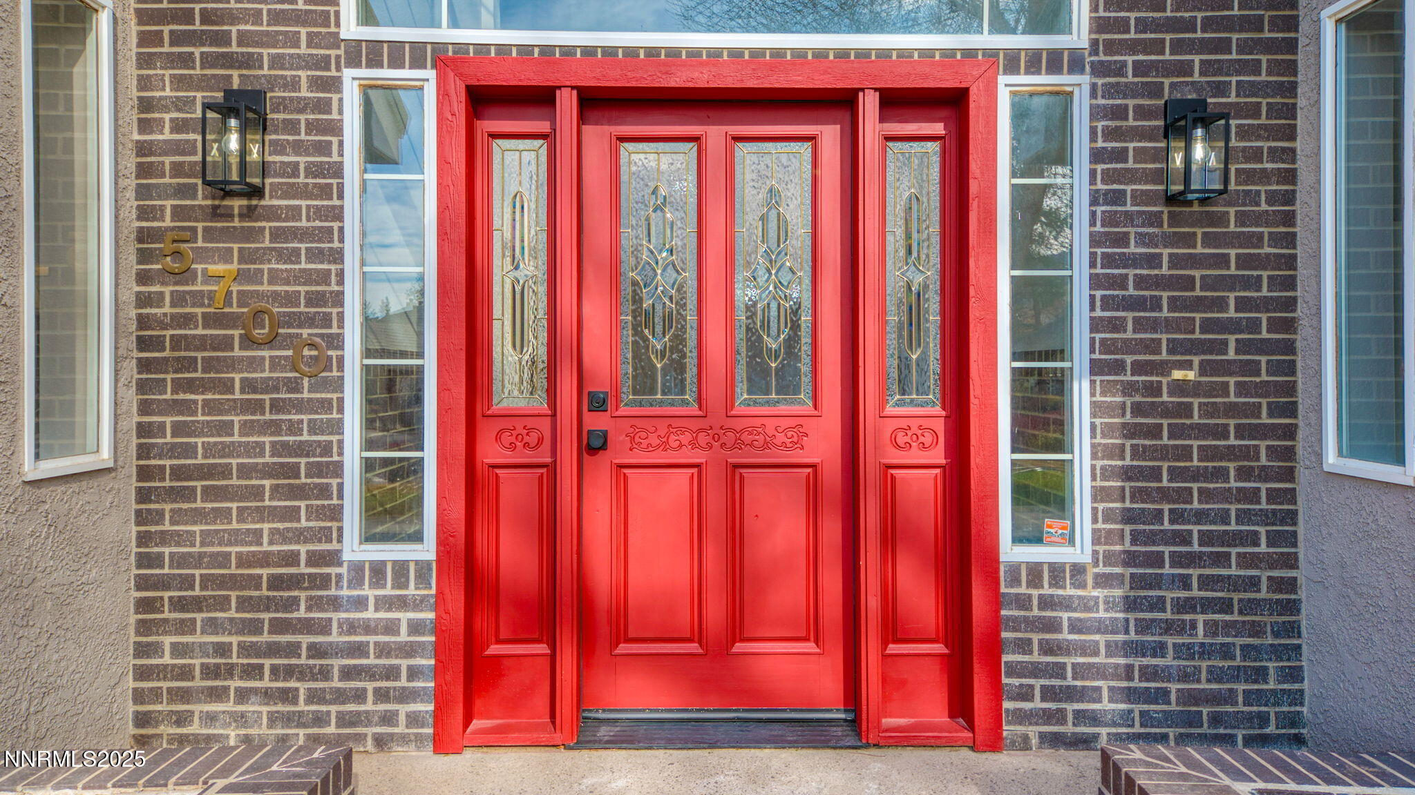 5700 East Hidden Valley Drive Reno, NV 89502 - Photo 16 of 91 a view of a red door of the house