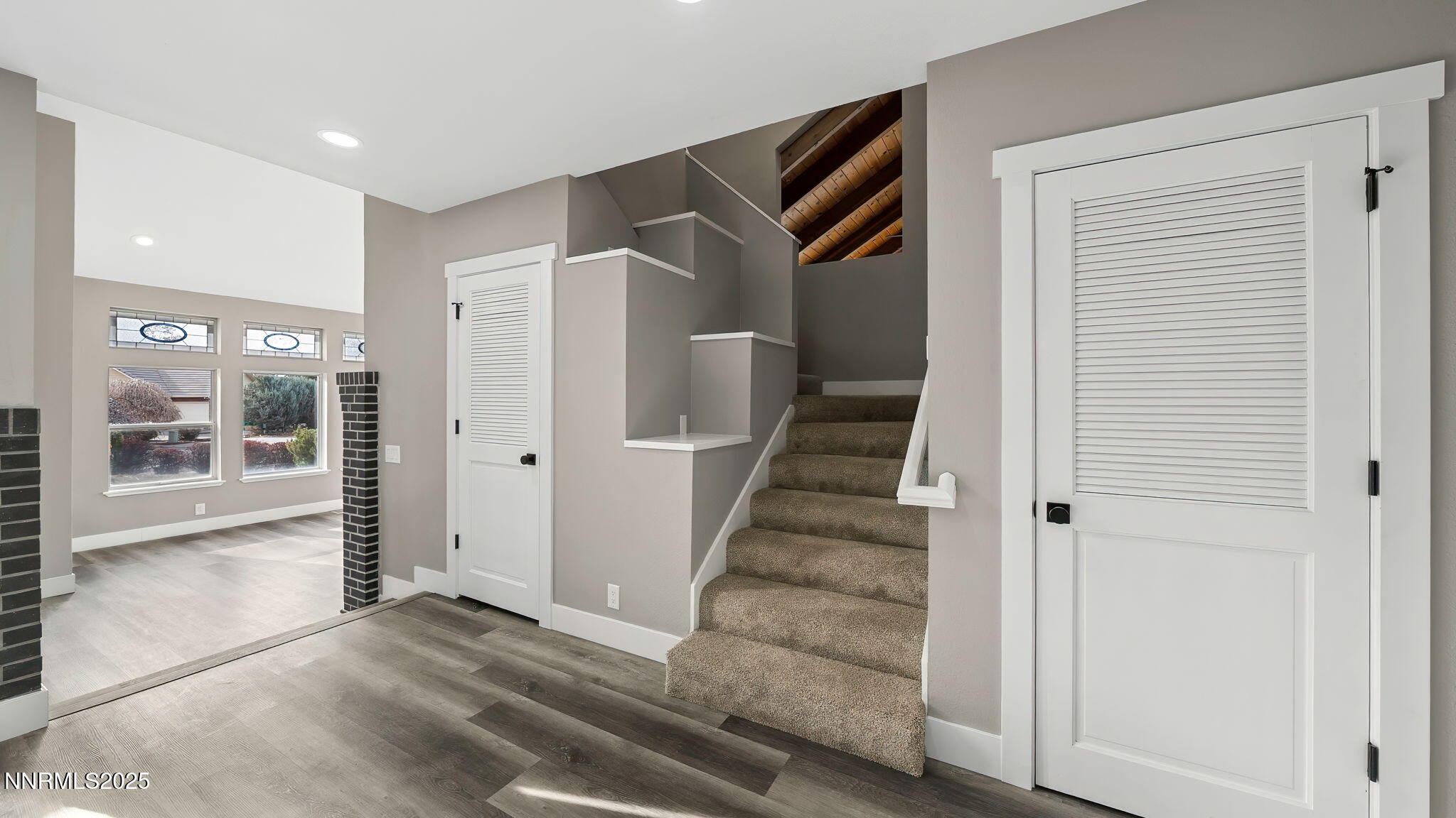 5700 East Hidden Valley Drive Reno, NV 89502 - Photo 21 of 91 a view of a hallway with wooden floor and entryway