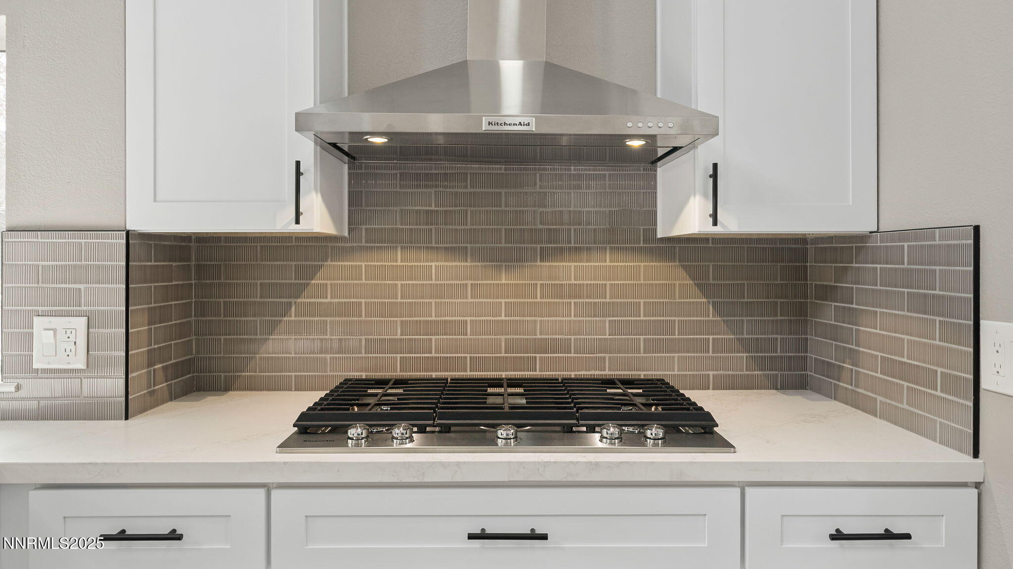 5700 East Hidden Valley Drive Reno, NV 89502 - Photo 33 of 91 a stove top oven sitting inside of a kitchen