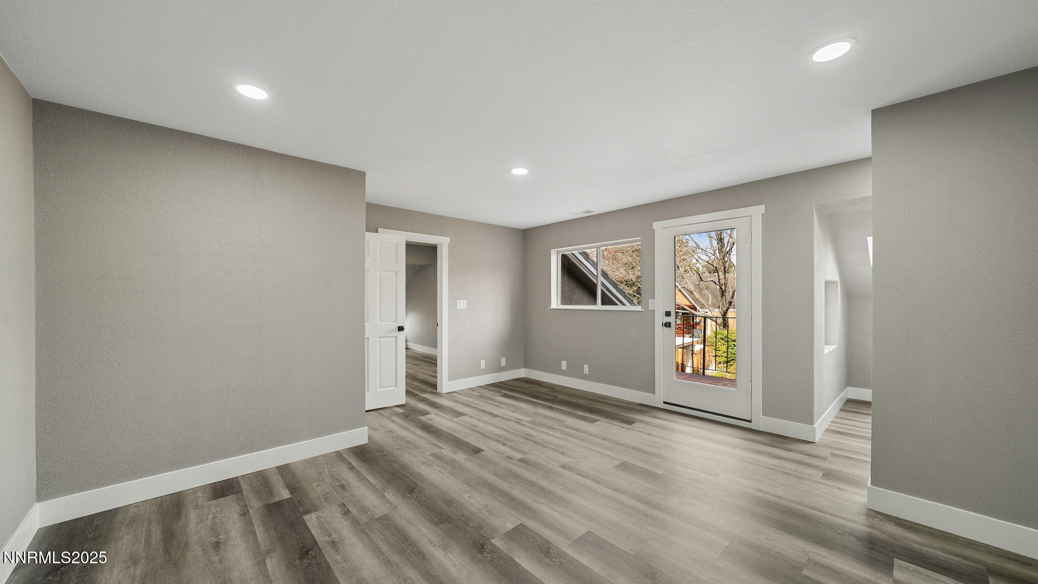 5700 East Hidden Valley Drive Reno, NV 89502 - Photo 54 of 91 an empty room with windows and closet