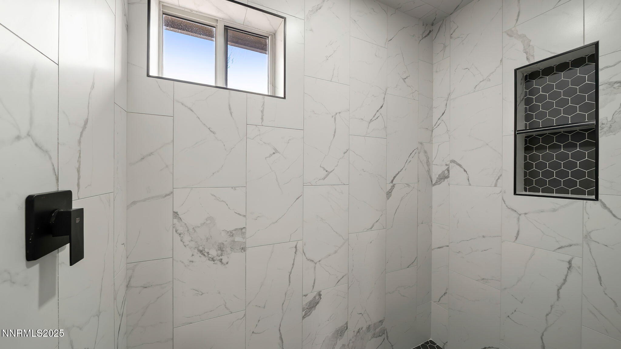 5700 East Hidden Valley Drive Reno, NV 89502 - Photo 60 of 91 a bathroom with a shower and a window