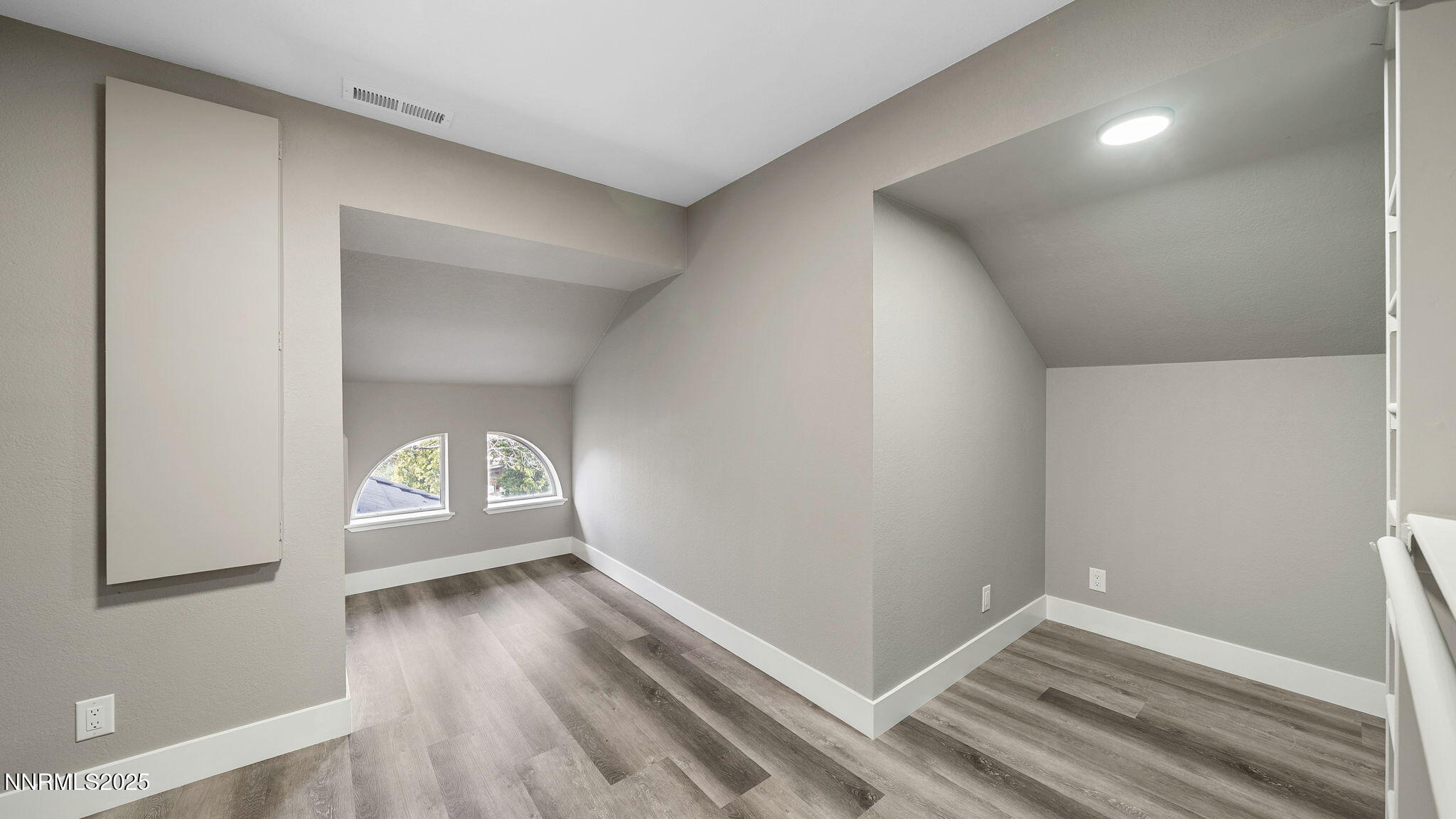 5700 East Hidden Valley Drive Reno, NV 89502 - Photo 62 of 91 a view of empty room with wooden floor