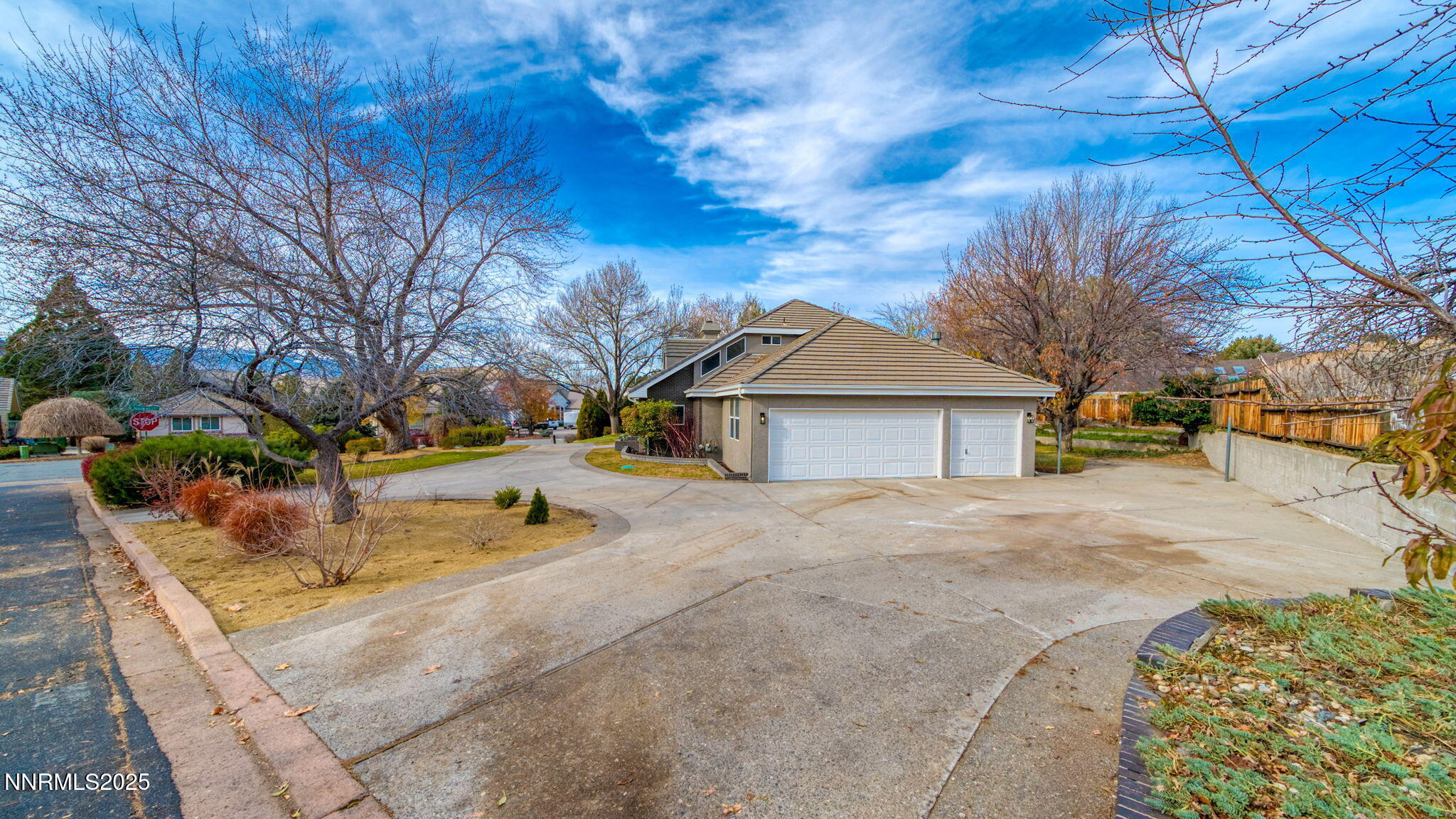 5700 East Hidden Valley Drive Reno, NV 89502 - Photo 9 of 91 a front view of a house with a yard
