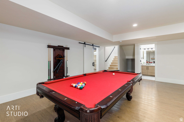 1188 South Old Trappers Loop Road Huntsville, UT 84317 - Photo 46 of 92 Recreation room featuring wood-finish flooring, recessed lighting, and a built-in cue rack